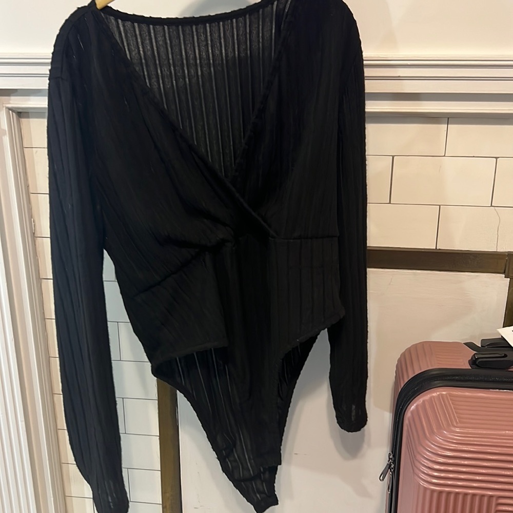 Shein ribbed black body suit . Never been worn . Size 3X